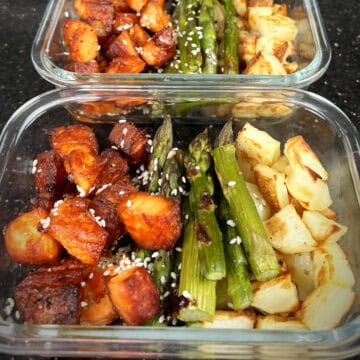 Maple glazed salmon with crispy potatoes and asparagus.